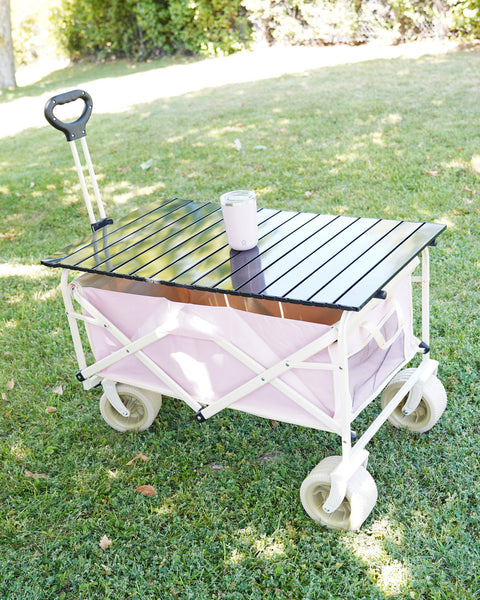 carrito plegable con mesa SAOCCO en césped verde