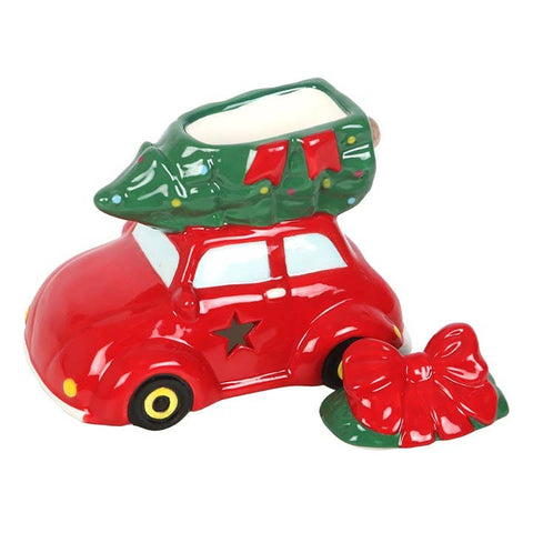 Quemador de aceite de coche clásico con árbol de Navidad