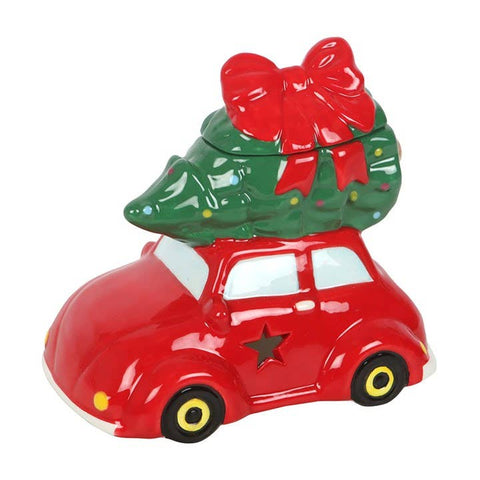 Quemador de aceite de coche clásico con árbol de Navidad