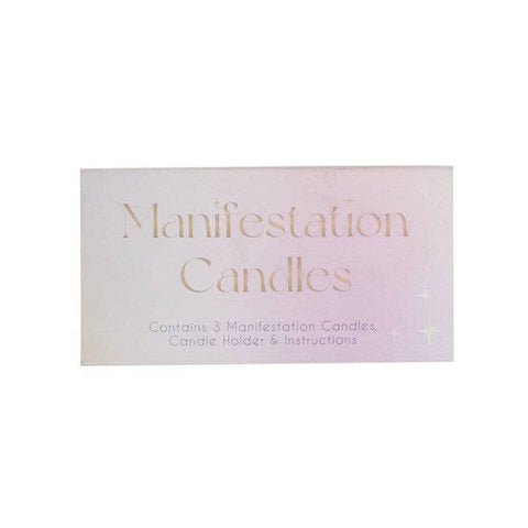 3 velas con hechizos de manifestación en una caja